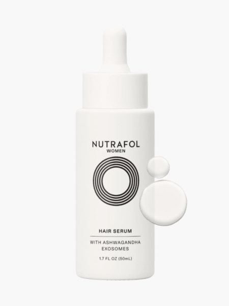 Hair Serum in branded white bottle with pipette on light gray background