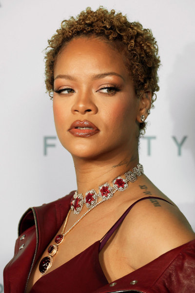 Rihanna wearing short curly hair