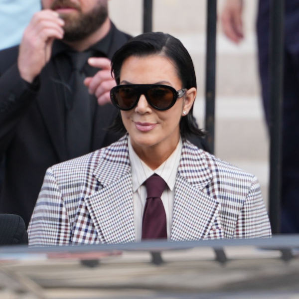 Image may contain Kris Jenner Kim Kardashian Accessories Sunglasses Formal Wear Tie Clothing Suit Adult Person